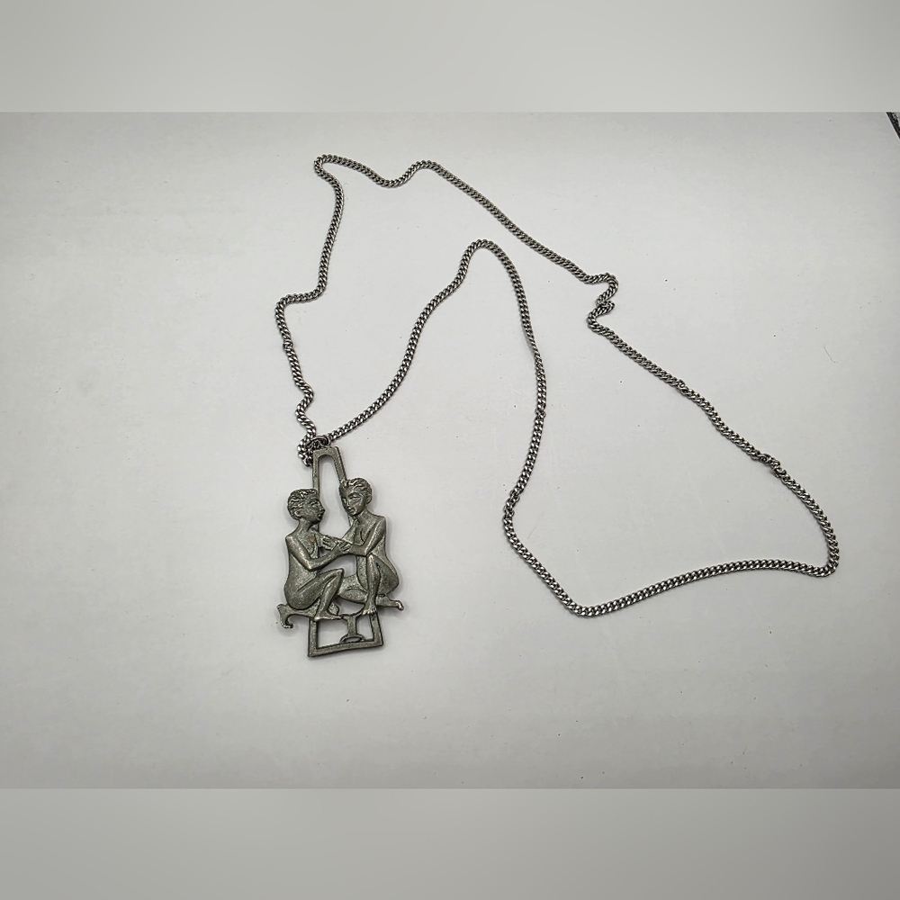 Vintage Cathedral Pewter Gemini Necklace